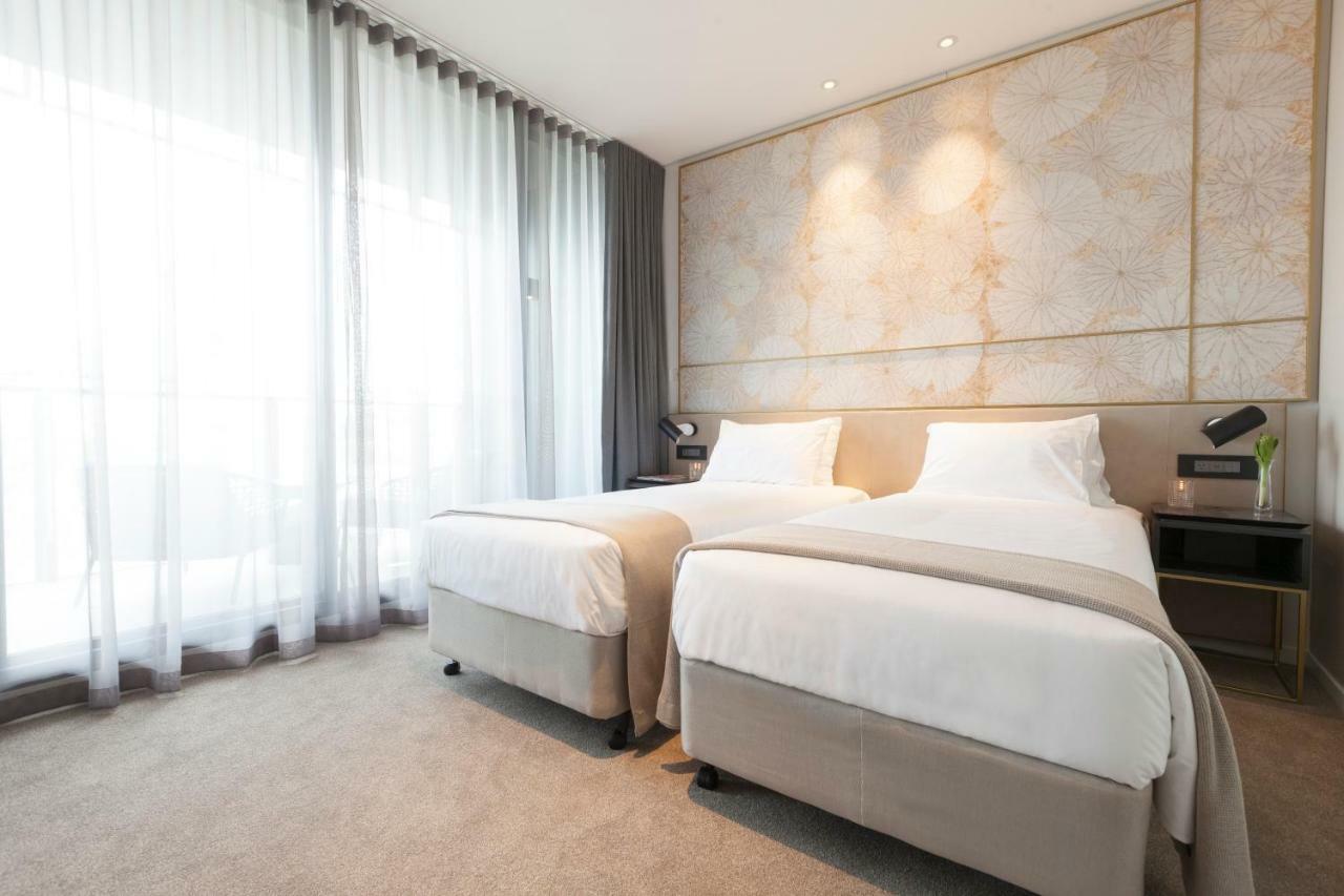 One Global Resorts Green Square Sydney Bagian luar foto Deluxe Room