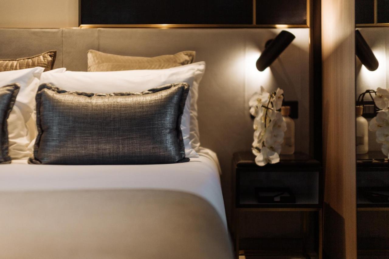 One Global Resorts Green Square Sydney Bagian luar foto A bed at the hotel