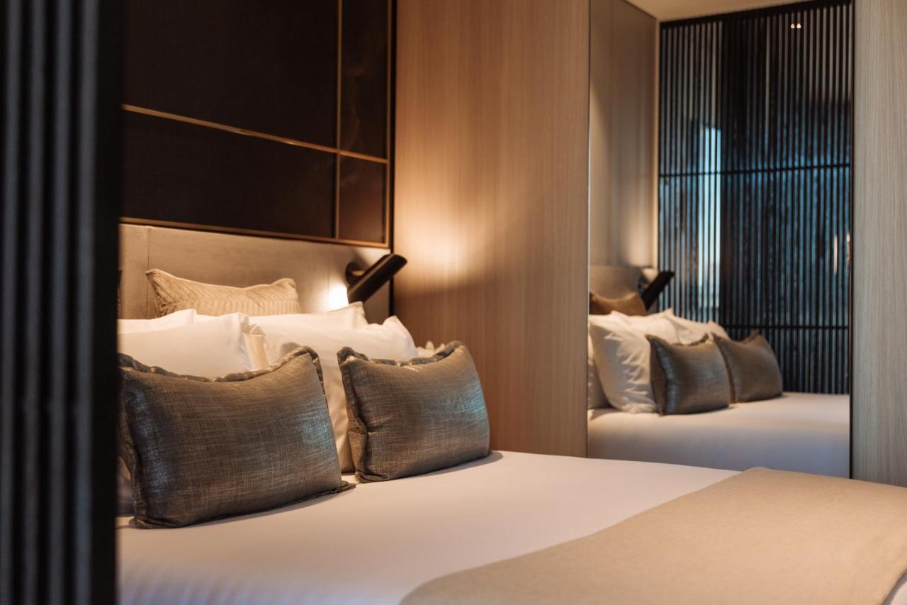 One Global Resorts Green Square Sydney Bagian luar foto A bedroom at the hotel