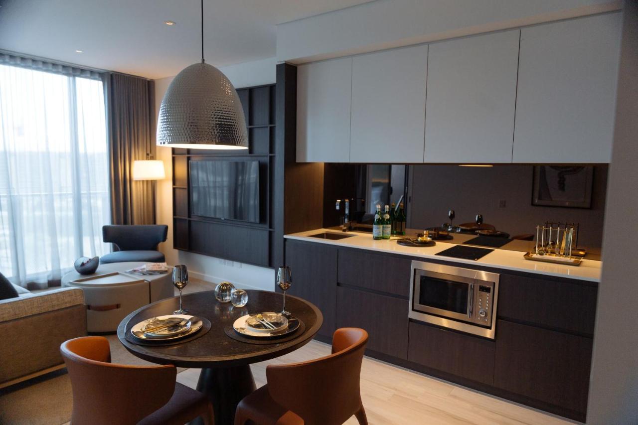 One Global Resorts Green Square Sydney Bagian luar foto A kitchen in a typical apartment