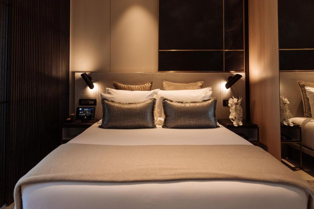 One Global Resorts Green Square Sydney Bagian luar foto A bedroom at The Hari